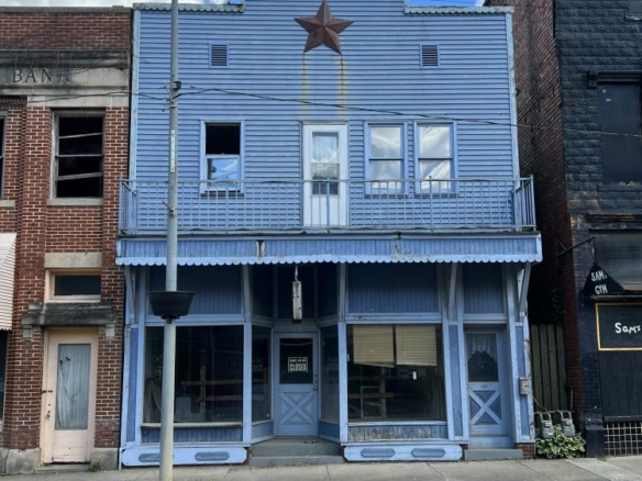 73 High Street, Glouster, Ohio, blue commercial building downtown Glouster
